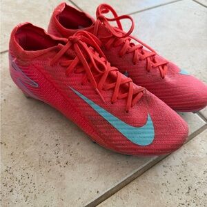 Nike bright pink and teal Soccer Cleats